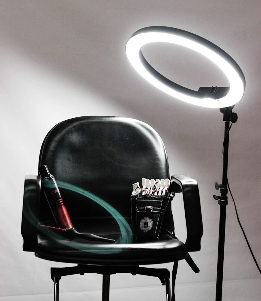 red and black steel tube on black leather padded chair